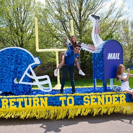 Blue and Yellow Return to Sender Complete Parade Float Theme